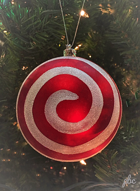 red and white pinwheel Christmas decoration